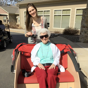 Senior getting a ride in a trishaw